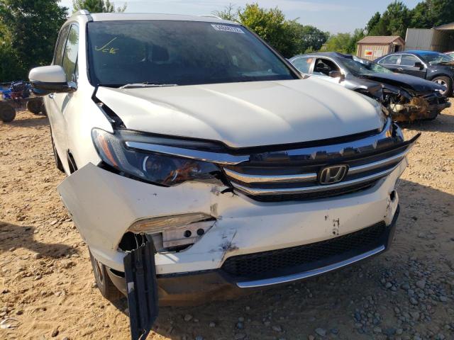 Photo 9 from auction – 2016 HONDA PILOT TOUR with VIN 5FNYF6H99GB047806