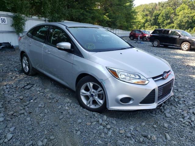 FORD FOCUS SE 2014 with VIN 1FADP3F20EL409375 - Photo from auction
