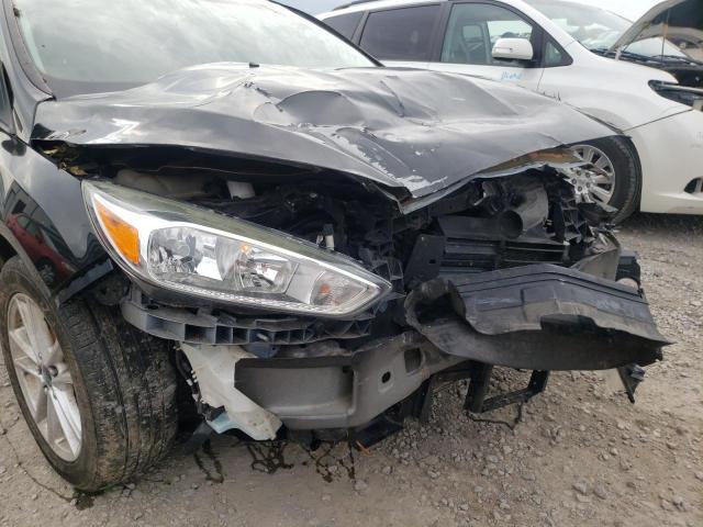 Photo 9 from auction – 2015 FORD FOCUS SE with VIN 1FADP3KE1FL285635