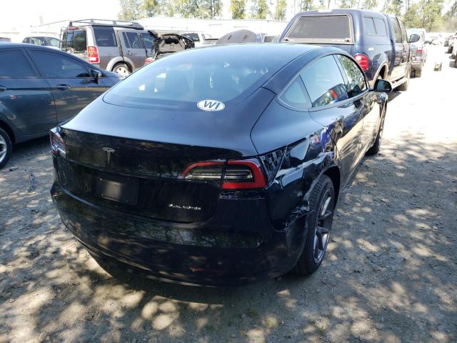 Photo 4 from auction – 2022 TESLA MODEL 3 with VIN 5YJ3E1EB0NF267694