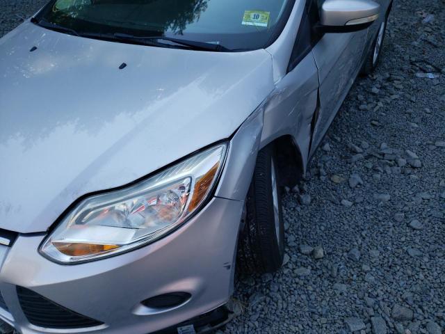 Photo 9 from auction – 2014 FORD FOCUS SE with VIN 1FADP3F20EL409375