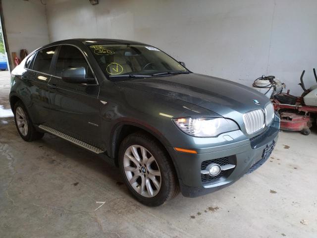 BMW X6 XDRIVE5 2011 with VIN 5UXFG8C59BLZ96412 - Photo from auction