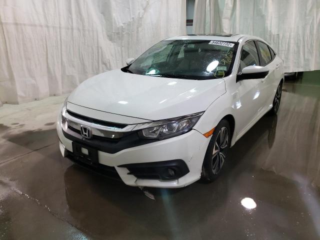 Photo 2 from auction – 2017 HONDA CIVIC EX with VIN 2HGFC1F36HH647844