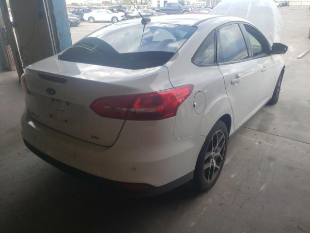 Photo 4 from auction – 2017 FORD FOCUS SEL with VIN 1FADP3H28HL328626