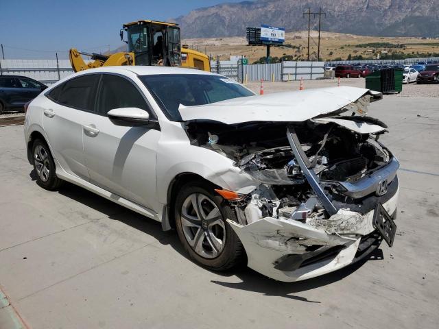 HONDA CIVIC LX 2018 with VIN 19XFC2F58JE015998 - Photo from auction