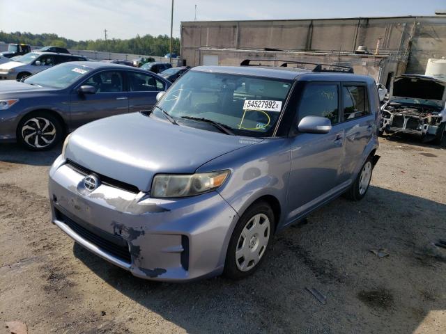 Photo 2 from auction – 2011 TOYOTA SCION with VIN JTLZE4FEXB1141047