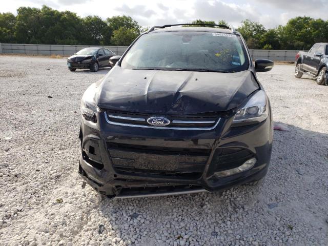 Photo 9 from auction – 2013 FORD ESCAPE with VIN 1FMCU0J98DUD85672