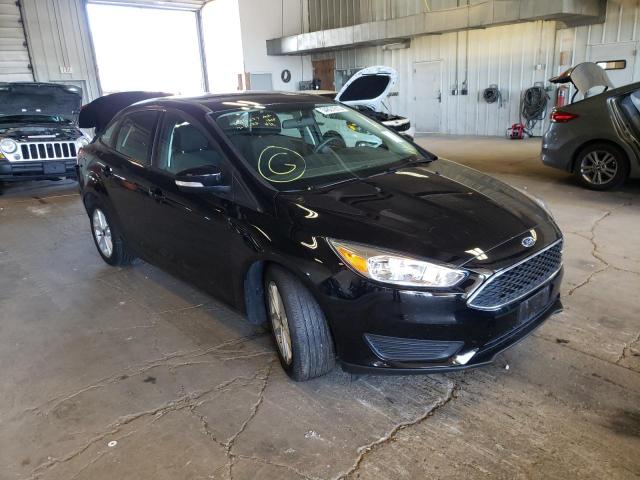FORD FOCUS SE 2017 with VIN 1FADP3F26HL294642 - Photo from auction