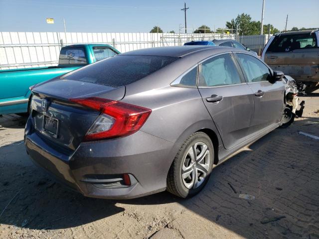 Photo 4 from auction – 2018 HONDA CIVIC LX with VIN 2HGFC2F50JH562091