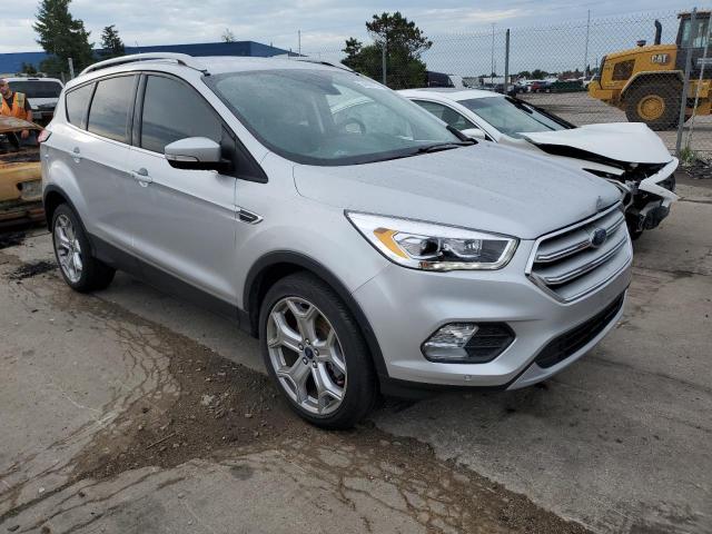 FORD ESCAPE TIT 2019 with VIN 1FMCU9J97KUA69696 - Photo from auction