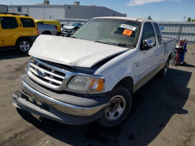 Photo 2 from auction – 1999 FORD F150 with VIN 1FTRX17W0XKC25083