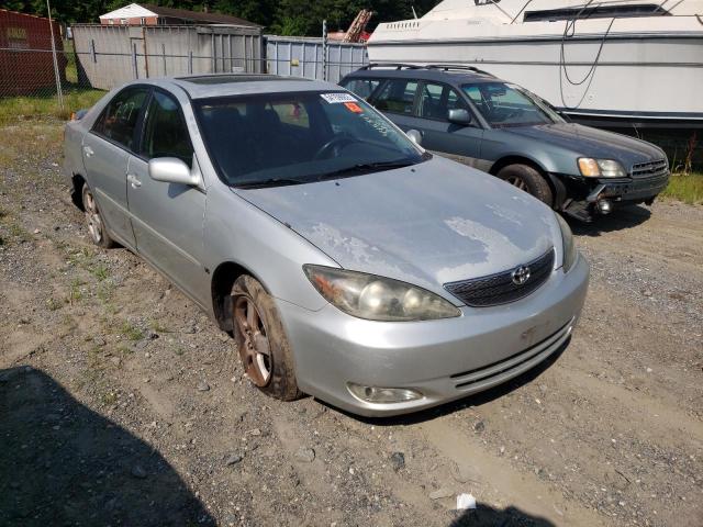 TOYOTA CAMRY LE 2003 with VIN 4T1BF30K43U050077 - Photo from auction