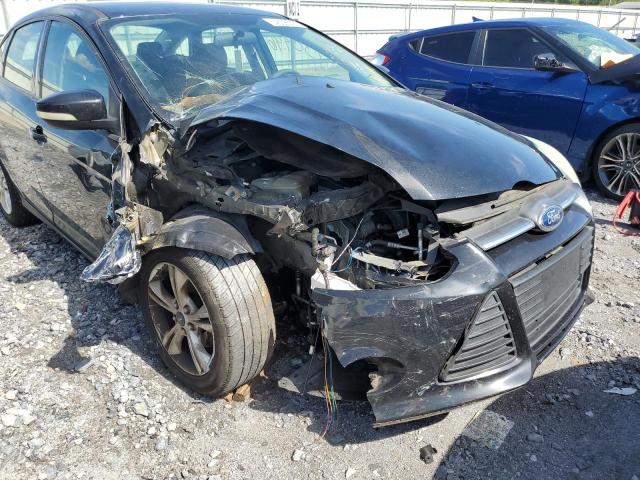 Photo 9 from auction – 2014 FORD FOCUS with VIN 1FADP3F20EL435460