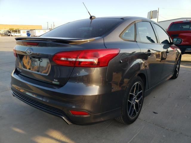 Photo 4 from auction – 2015 FORD FOCUS SE with VIN 1FADP3FE9FL379823