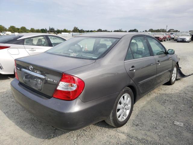 Photo 4 from auction – 2003 TOYOTA CAMRY LE with VIN 4T1BE30K73U641409