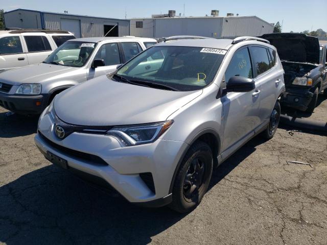 Photo 2 from auction – 2018 TOYOTA RAV4 LE with VIN 2T3ZFREV1JW490766