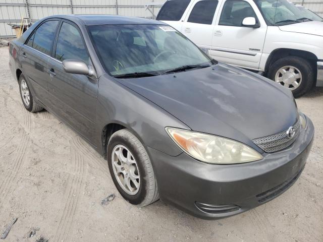 TOYOTA CAMRY LE 2002 with VIN JTDBE32K520025232 - Photo from auction