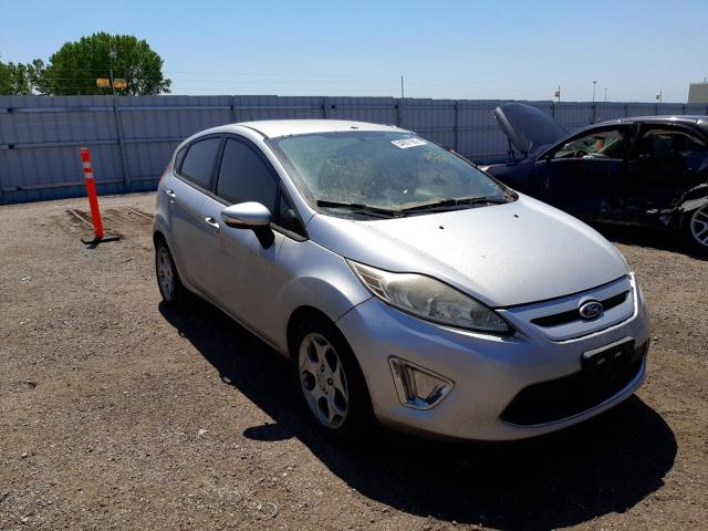 FORD FIESTA SES 2011 with VIN 3FADP4FJ6BM149281 - Photo from auction