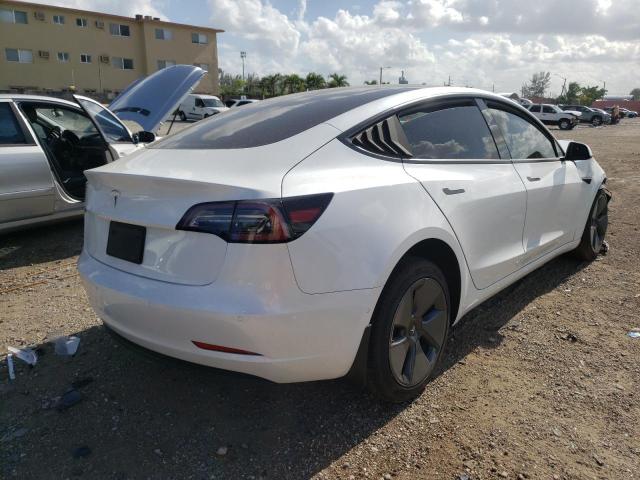 Photo 4 from auction – 2021 TESLA MODEL 3 with VIN 5YJ3E1EA5MF028387