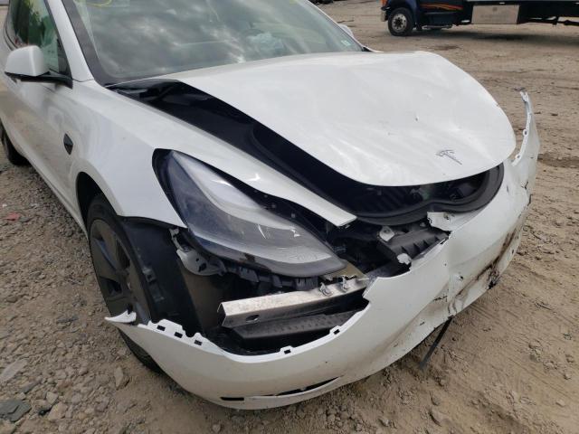 Photo 9 from auction – 2021 TESLA MODEL 3 with VIN 5YJ3E1EBXMF978995