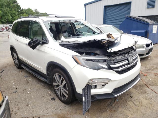 Photo 1 from auction – 2016 HONDA PILOT TOUR with VIN 5FNYF5H97GB027581