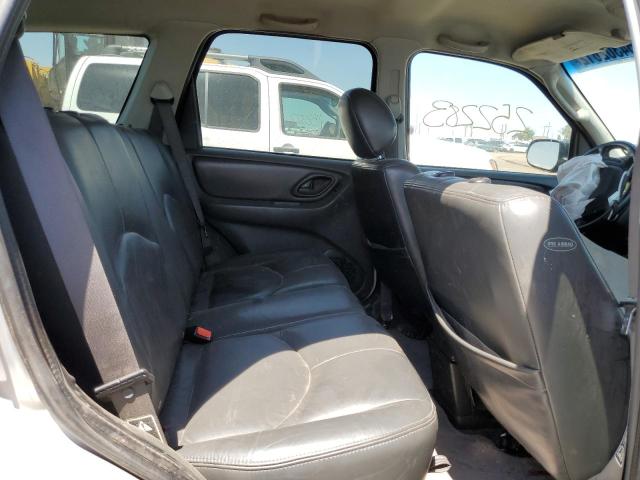 Photo 6 from auction – 2004 MAZDA TRIBUTE with VIN 4F2CZ06144KM09471