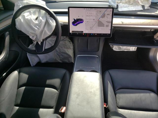 Photo 9 from auction – 2021 TESLA MODEL 3 with VIN 5YJ3E1EA5MF028387