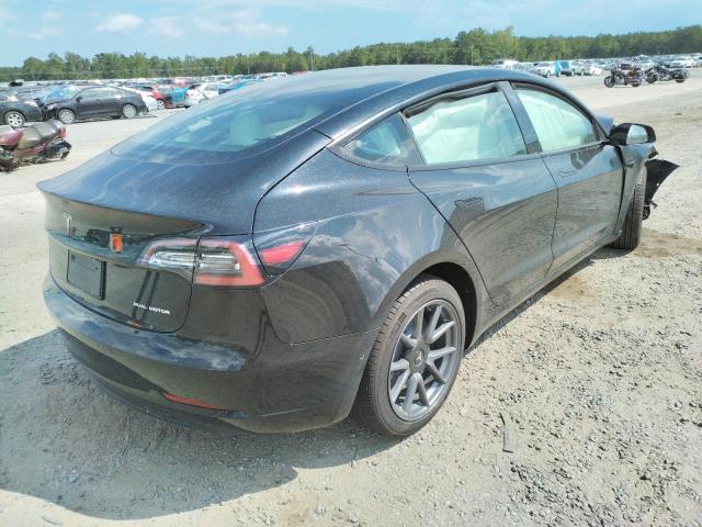 Photo 4 from auction – 2022 TESLA MODEL 3 with VIN 5YJ3E1EB0NF102079