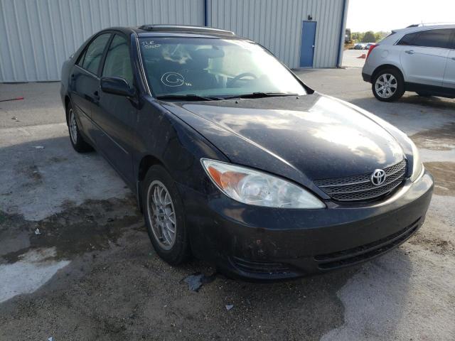 TOYOTA CAMRY LE 2002 with VIN 4T1BE30K12U052242 - Photo from auction