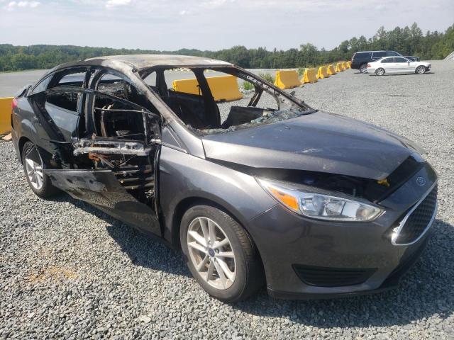 FORD FOCUS SE 2018 with VIN 1FADP3FE9JL275065 - Photo from auction