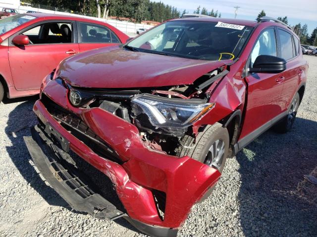 Photo 2 from auction – 2018 TOYOTA RAV4 LE with VIN 2T3BFREV0JW845251