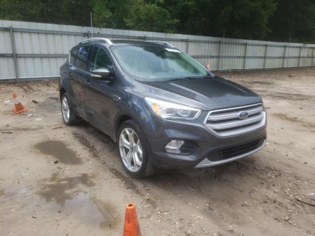 FORD ESCAPE TIT 2019 with VIN 1FMCU9J96KUA30243 - Photo from auction