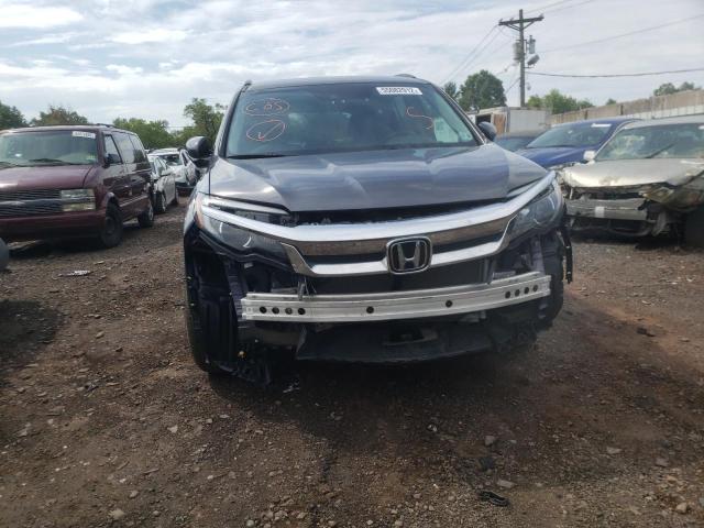 Photo 9 from auction – 2020 HONDA PILOT EXL with VIN 5FNYF6H38LB059628