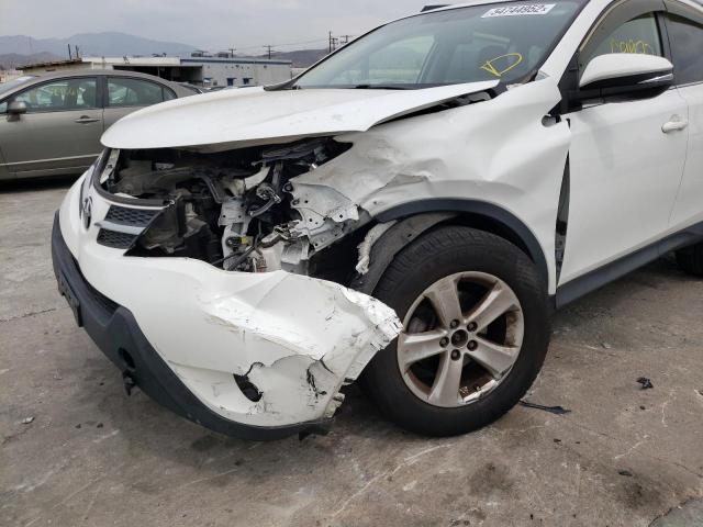 Photo 9 from auction – 2014 TOYOTA RAV4 XLE with VIN JTMWFREVXED034271