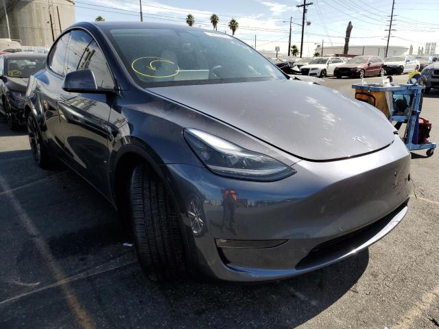 TESLA MODEL Y 2022 with VIN 7SAYGDEF6NF350697 - Photo from auction