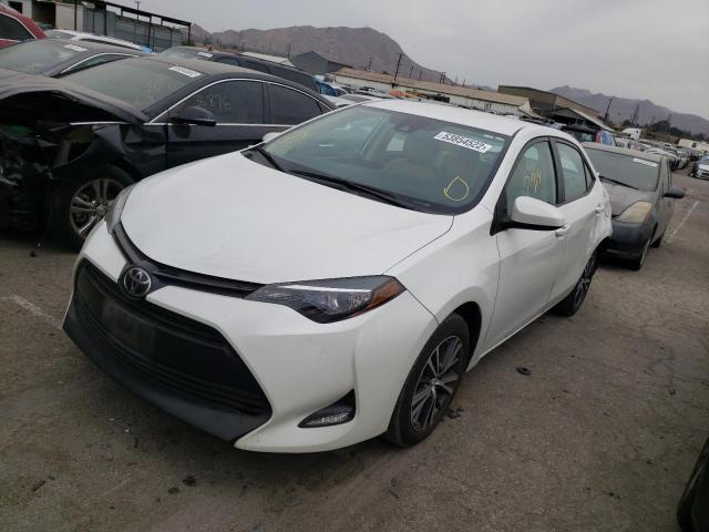 Photo 2 from auction – 2017 TOYOTA COROLLA L with VIN 5YFBURHE9HP635981