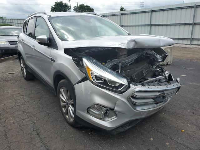 FORD ESCAPE TIT 2017 with VIN 1FMCU9J95HUC13058 - Photo from auction