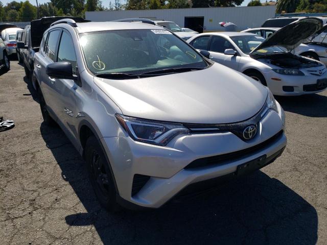 TOYOTA RAV4 LE 2018 with VIN 2T3ZFREV1JW490766 - Photo from auction