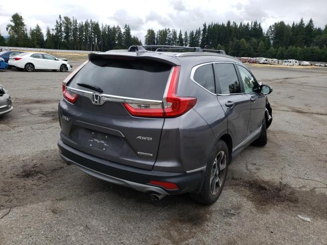 Photo 4 from auction – 2018 HONDA CR-V TOURI with VIN 2HKRW2H96JH651920