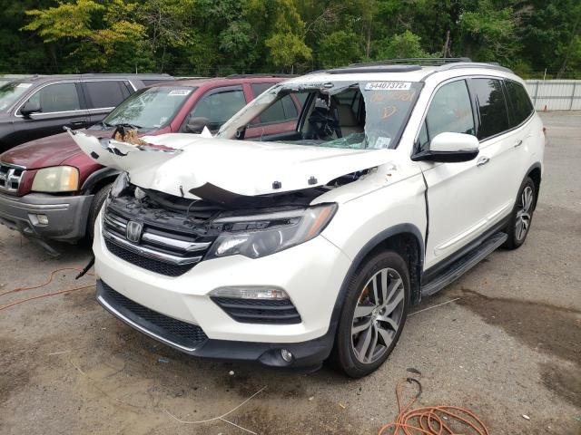 Photo 2 from auction – 2016 HONDA PILOT TOUR with VIN 5FNYF5H97GB027581