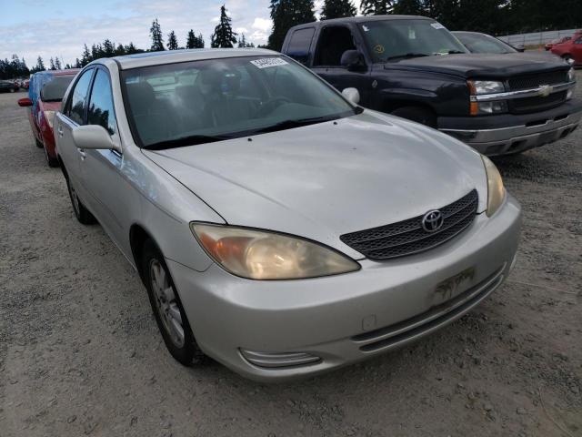 TOYOTA CAMRY LE 2002 with VIN JTDBF30K120003079 - Photo from auction