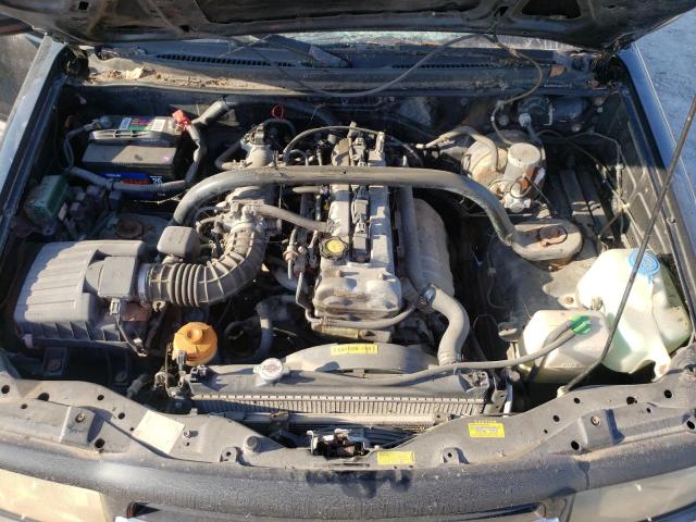 Photo 7 from auction – 2000 CHEVROLET TRACKER with VIN 2CNBJ13C7Y6924693