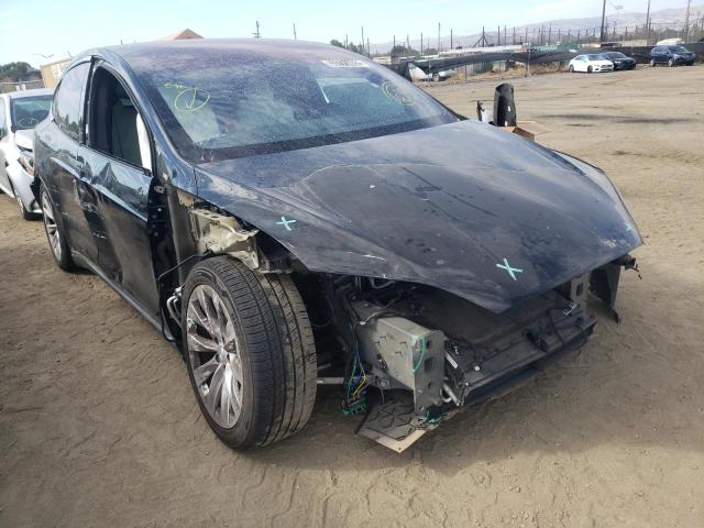 TESLA MODEL X 2018 with VIN 5YJXCAE29JF137334 - Photo from auction