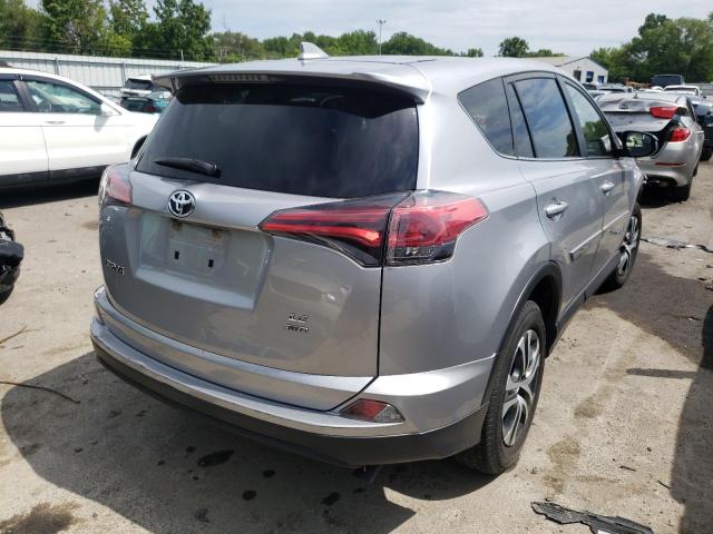 Photo 4 from auction – 2018 TOYOTA RAV4 LE with VIN JTMBFREV6JJ200697