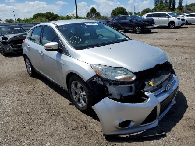 FORD FOCUS SE 2014 with VIN 1FADP3K25EL340219 - Photo from auction