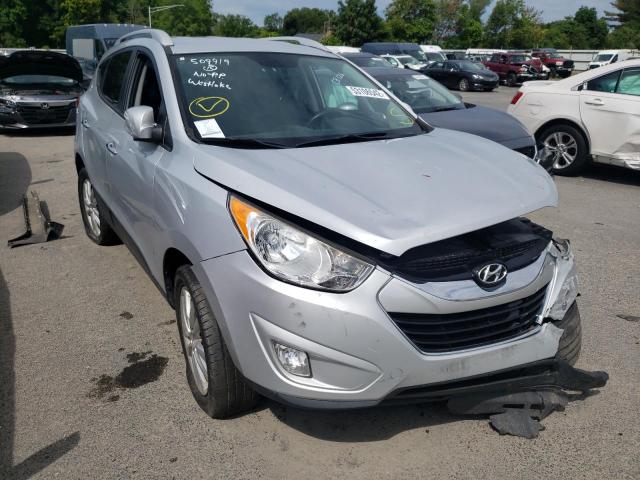 HYUNDAI TUCSON GLS 2012 with VIN KM8JUCAC9CU509919 - Photo from auction