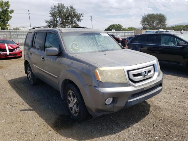 HONDA PILOT TOUR 2011 with VIN 5FNYF3H94BB005910 - Photo from auction