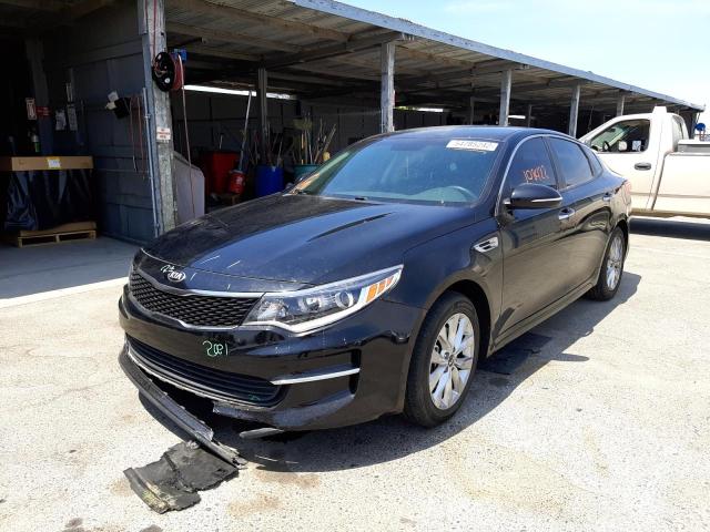Photo 2 from auction – 2018 KIA OPTIMA LX with VIN 5XXGT4L37JG264884