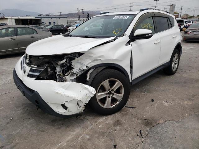 Photo 2 from auction – 2014 TOYOTA RAV4 XLE with VIN JTMWFREVXED034271