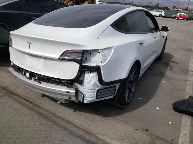 Photo 4 from auction – 2021 TESLA MODEL 3 with VIN 5YJ3E1EA3MF876980